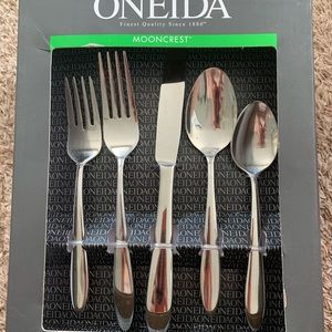 Brand new unopened Oneida moon rest silverware set